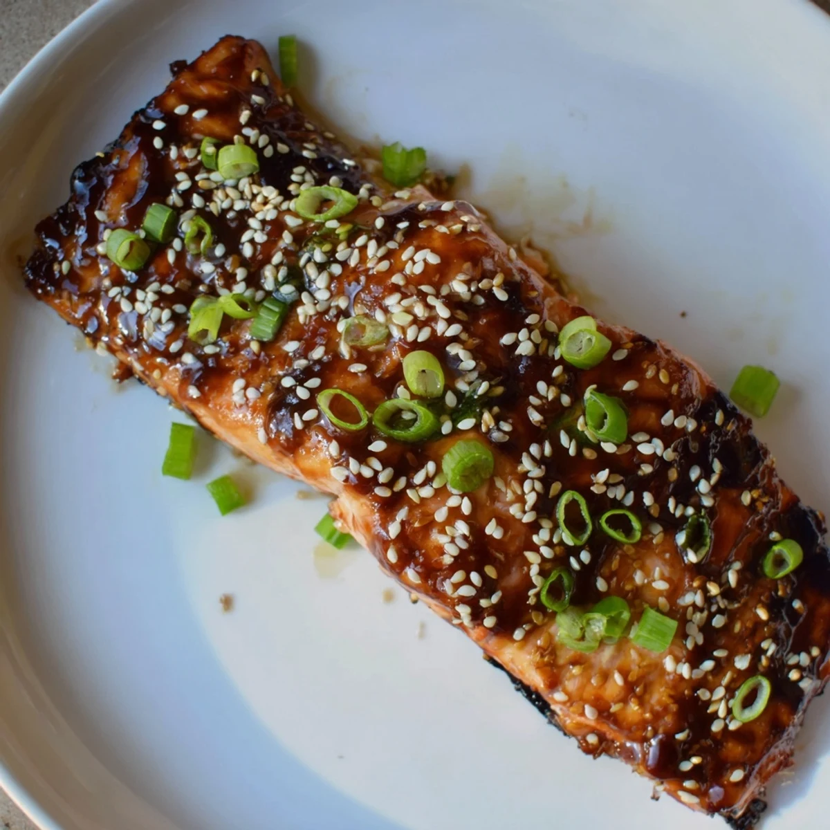 Enjoy the savory aroma of this Maple Soy Salmon, perfectly cooked and ready to eat tonight.