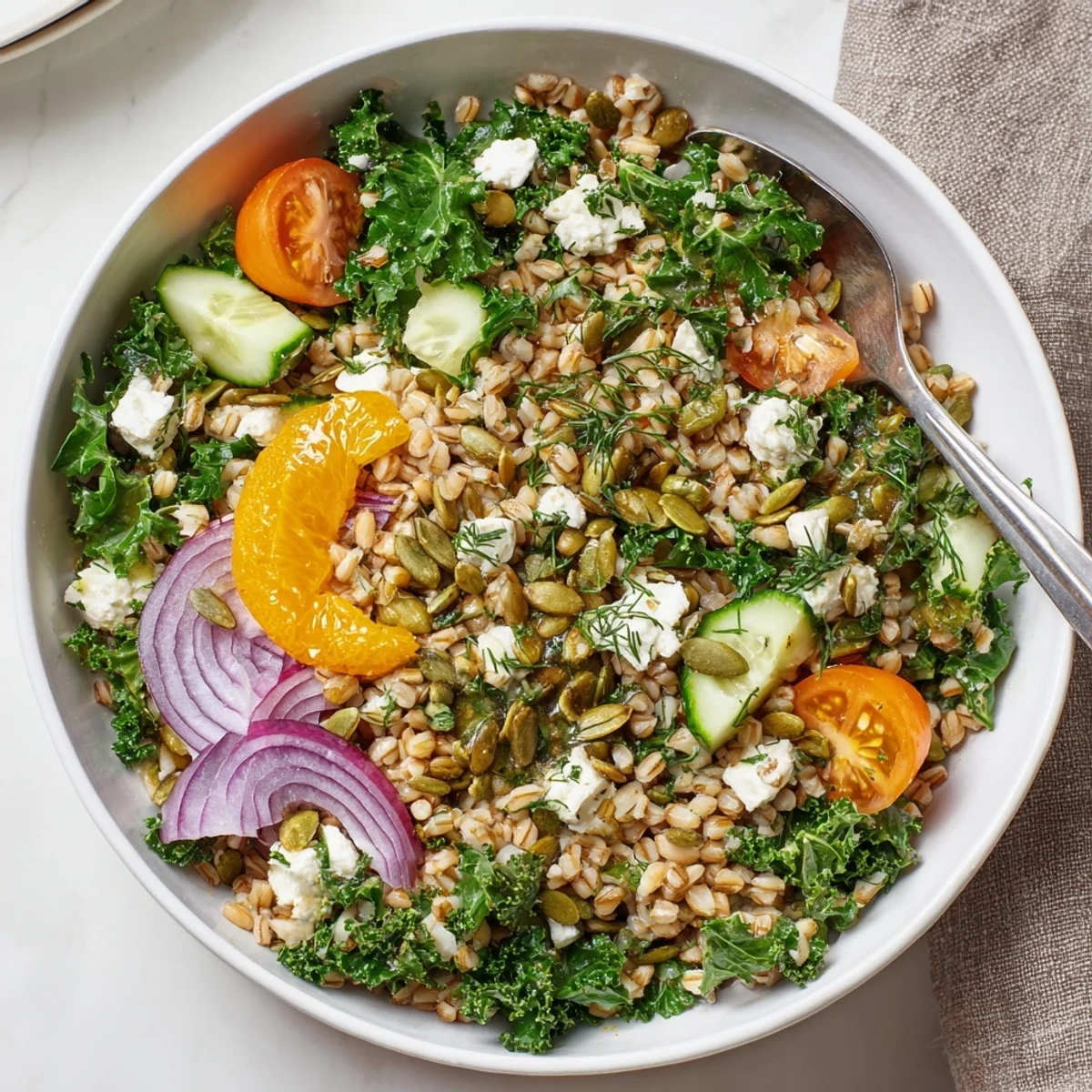 Citrus Herb Barley and Kale Bowl with glistening citrus dressing and toasted seeds