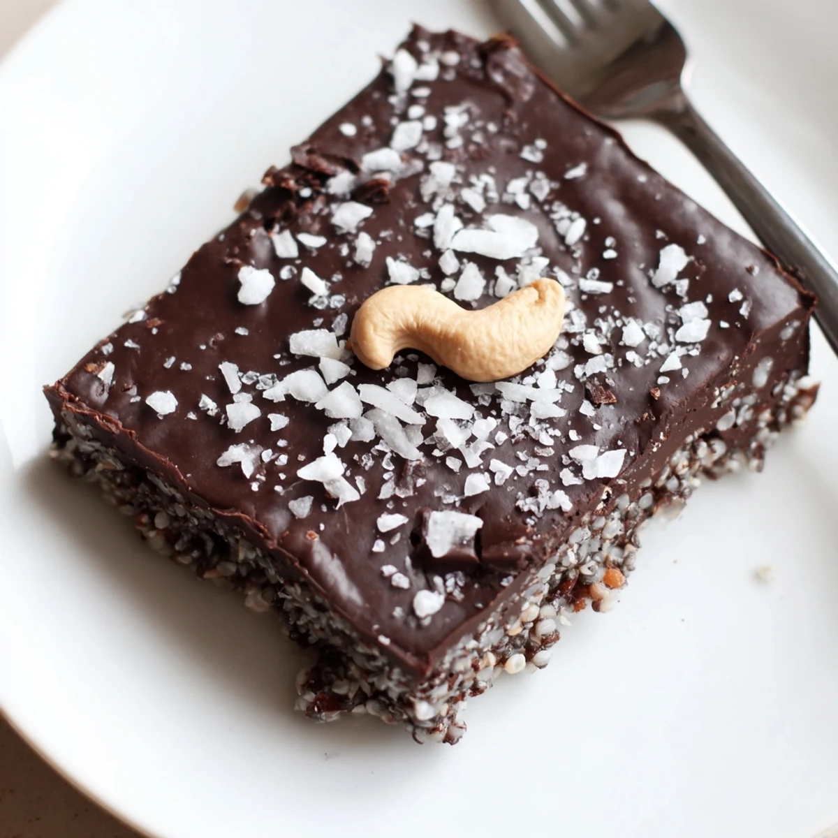 Cocoa Cashew Coconut Chia Indulgence chilled squares with glossy chocolate topping, nutty aroma