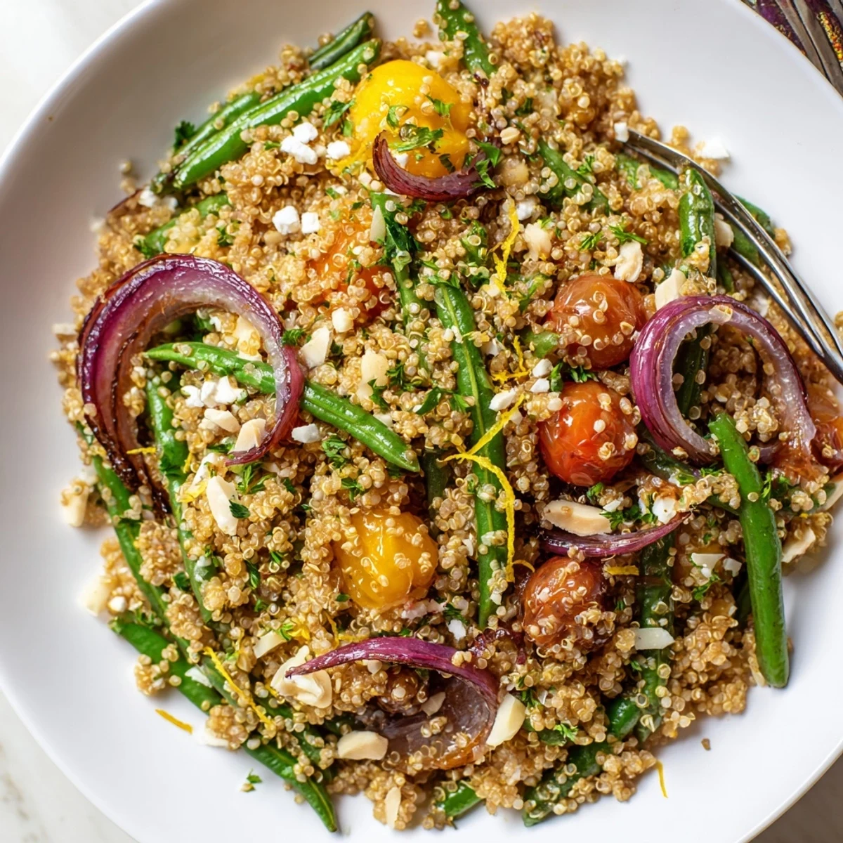 Serve Warm Quinoa and Roasted Green Bean Salad drizzled with lemon vinaigrette