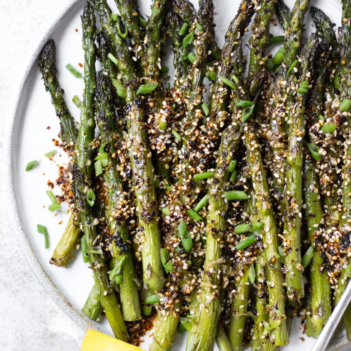Glistening with sesame oil, Roasted Asparagus With Toasted Sesame Crunch offers nutty crunch.