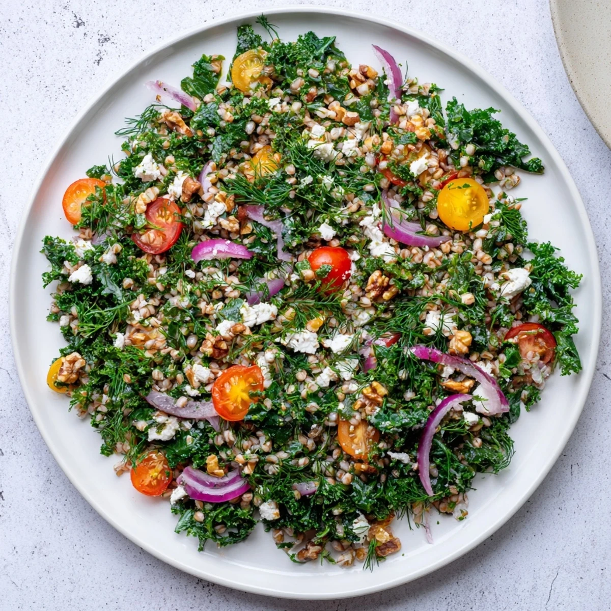 Fresh citrus herb barley and kale salad featuring nutty grains and vibrant vegetables in a light vinaigrette